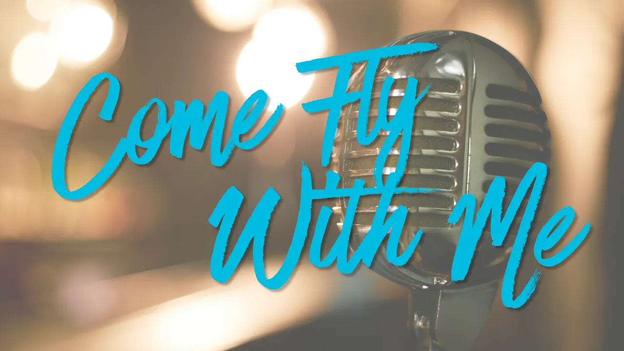 Vintage microphone with blurred lights in the background and text saying 'Come Fly With Me' in blue.
